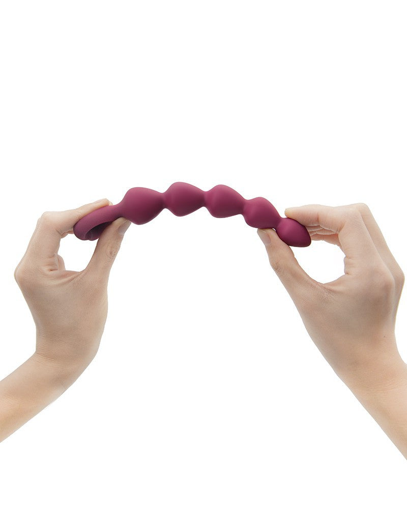 Wonderstate Sexual Wellness Anal Beads Medium by Love to Love with hands