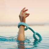 Playful Handcuffs for couples play by Biird in turquoise in water