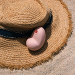 Clitoral vibrator and satisfyer suction Namii by Biird in pink with hat