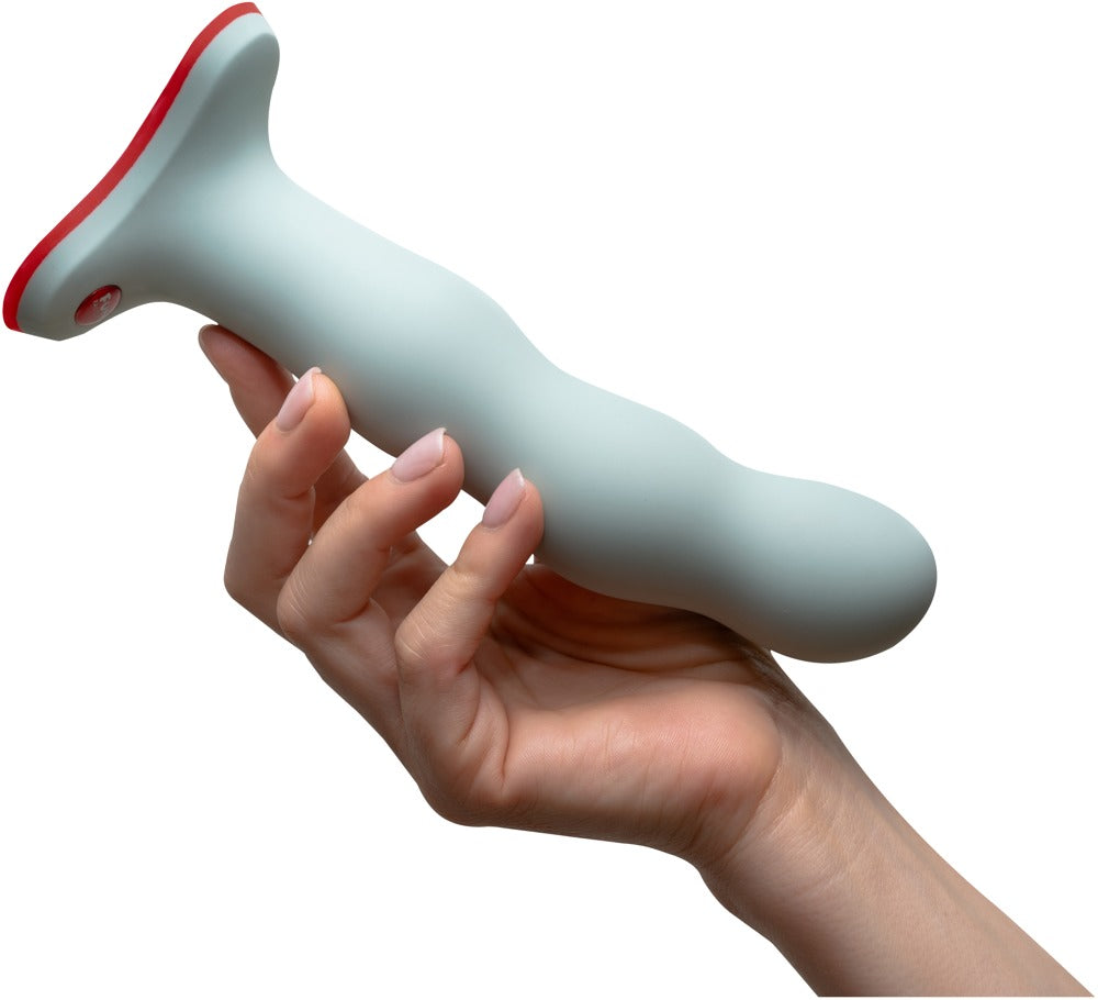 Wonderstate Sexual Wellness Fun Factory Bouncer Dildo in color sage with hand