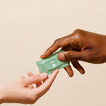 Wonderstate Sexual Wellness Ultra Thin Natural Latex Condoms by my lubie hands holding a condom